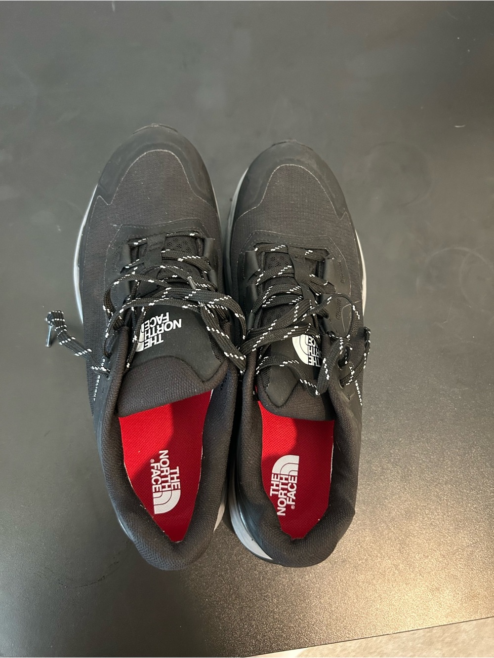 The North Face Black Athletic Sneakers with Red Insoles